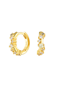 Jemima Huggies by Avant Studio, dainty gold hoops with pastel CZ gems. Perfect for subtle ear stacks and everyday styling.
