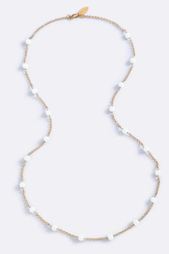 Endless Summer Beads White Glo by Emma Pills – gold plated long necklace with white enamel bead detailing.