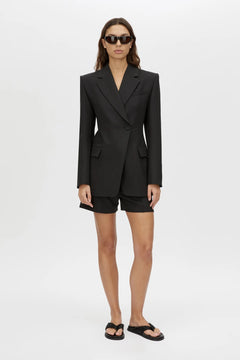 Floret Blazer by Camilla and Marc, a fitted black wool-blend blazer with shoulder pads, fabric-covered buttons and a tailored silhouette.