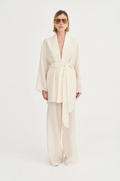 Giulia Pants Ivory Leaf by Solaqua – relaxed straight-leg pants with elastic waistband and subtle leaf print.