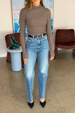 High Waisted Tunnel Vision Sneak Girls Just Want To Have Sun by MOTHER - wide leg jeans in mid blue wash, designed for a high rise fit.