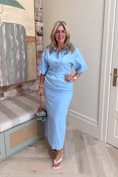 Lefka Midi Dress in Blue by Sneaky Link, linen midi with cinched waist, exaggerated sleeves, and flattering tummy ruching.
