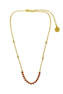 Ivy Necklace by Mountain and Moon — a gold garnet-CZ tennis necklace with vintage bezels and ball-work chain, perfect for bold elegant styling.