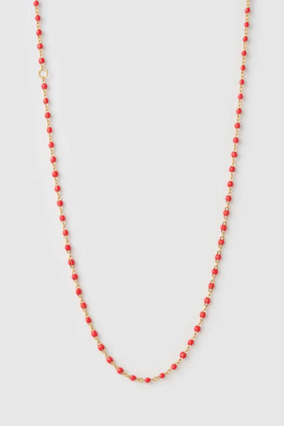 Peggy Necklace Cherry by Arms of Eve, a dainty gold chain with cherry enamel beads, perfect for summer layering and open-back looks.