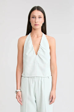 Santo Halter Top by Pfeiffer, halter top with ruching and tailored fit, perfect for pairing with pants or denim for elevated looks