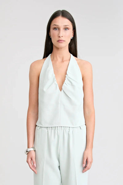 Santo Halter Top by Pfeiffer, halter top with ruching and tailored fit, perfect for pairing with pants or denim for elevated looks