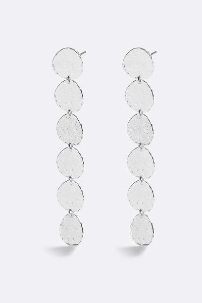 Sunset Hour Earrings Silver by Emma Pills - long silver drop earrings with hammered texture, designed for a bold statement look.
