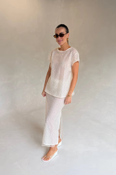 The Chelsea Beaded Top Ivory by Solaqua – sheer beaded top with geometric embellishments and detachable camisole.