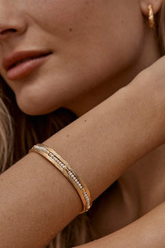 Zuni Bracelet by Amber Sceats - gold cuff bracelet with freshwater pearls, designed for a bold elevated statement look.