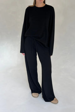 Black Charli knitted long sleeve top with a fitted silhouette and crew neckline.