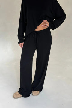 Black Charli knitted long sleeve top with a fitted silhouette and crew neckline.