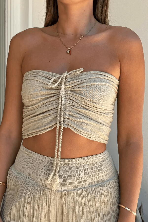 Ruched Tube Top Sand by D'Artemide, soft cotton with ruched back and front tie, perfect for trendy viral casual looks and stylish everyday wear.