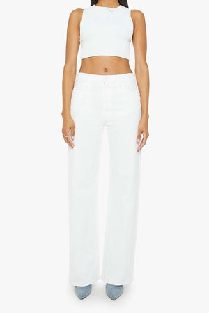 The Dodger Sneak Totally Innocent by MOTHER, trendy low-rise jeans with a slouchy, loose straight-leg fit and subtle whiskering. Perfect for casual days, offering comfort and style in a light-blue wash.