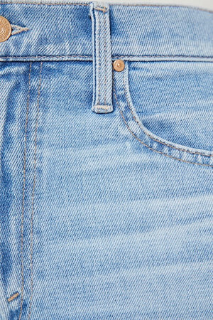 The Rambler Zip Ankle Look Ma, No Hands! by MOTHER, trendy high-waisted jeans with a wide leg and ankle cut. Perfect for a relaxed, stylish look with light-blue whiskering and fading.