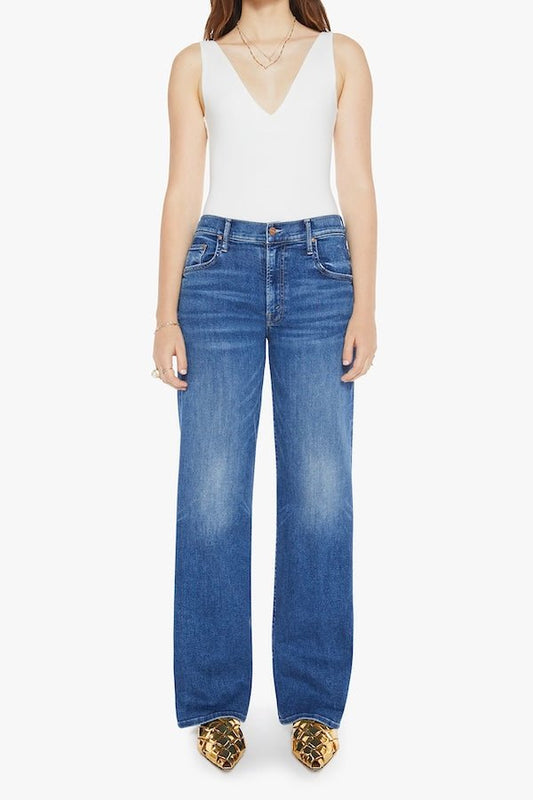 The Mid Rise Maven Sneak Over The Top by MOTHER, trendy mid-rise jeans with a relaxed wide-leg fit and subtle whiskering. Perfect for an effortlessly cool look with a vintage-inspired touch, crafted from recycled stretch denim.