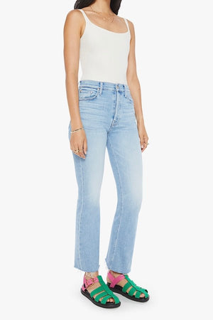 The Tripper Flood Fray Look Ma, No Hands! by MOTHER, trendy high-rise flare jeans with a button fly and frayed hem. Perfect for a stylish look with light-blue whiskering and fading.