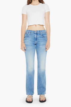 The Bookie Sneak Eye Of The Tiger by MOTHER, trendy high-rise bootcut jeans with a fitted hip and looser leg. Perfect for a relaxed, stylish look with whiskering and fading at the knees.