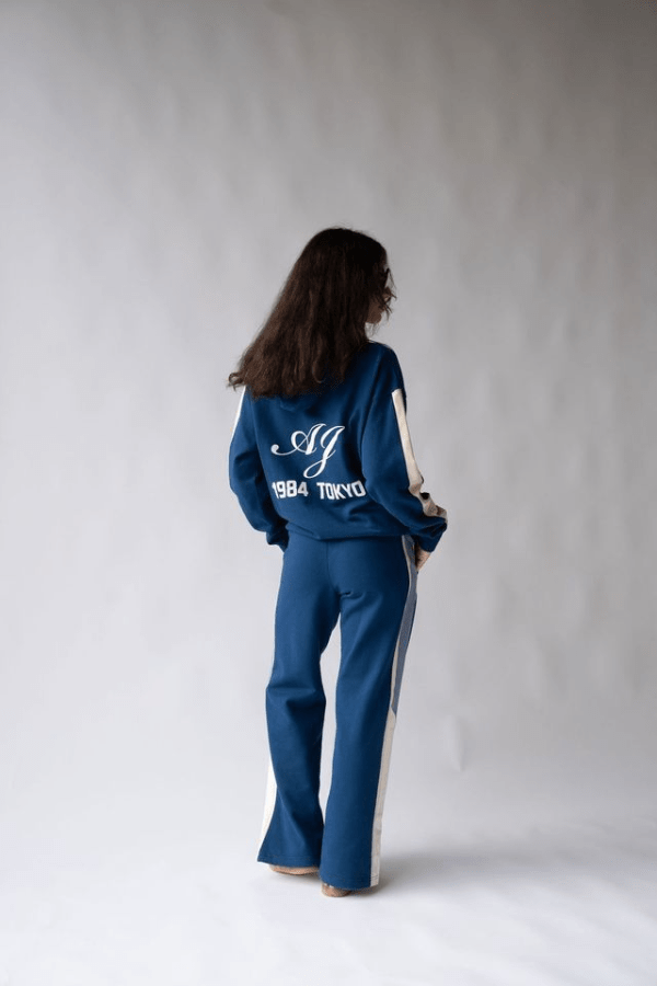 1984 Hoodie Estate Blue by Araminta James, soft cotton brushed fleece with contrast trim and velvet graphic, relaxed fit perfect for casual cool days.