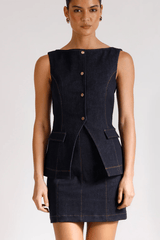 Good Vibes Top Indigo by Pasduchas – Trendy stretch denim with structured fit, gold snap studs, and mock pockets; perfect for chic, coordinated looks.