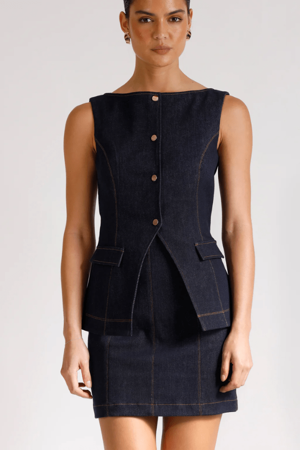 Good Vibes Top Indigo by Pasduchas – Trendy stretch denim with structured fit, gold snap studs, and mock pockets; perfect for chic, coordinated looks.