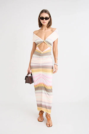 Elara Dress by Pfeiffer — a peach-toned stretch jersey midi with adjustable ties and front ruching for a custom, flattering silhouette.