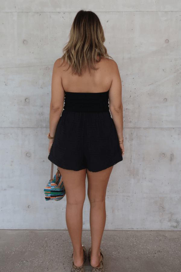 Bella Halter Tank Black by Sneaky Link – A chic, breathable cotton-spandex tank with a deep scoop neckline and open back, perfect for layering or solo wear.
