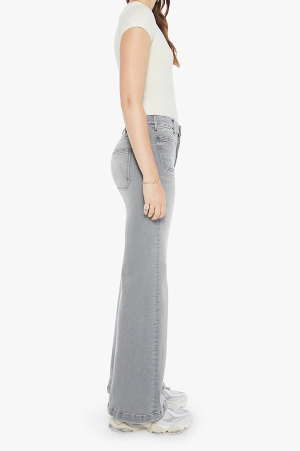 The Hustler Roller Patch Pocket Sneak Noted! by MOTHER, trendy 70s-inspired wide-leg jeans with a high rise and patch pockets. Perfect for a relaxed, stylish look in faded light grey with a clean hem.