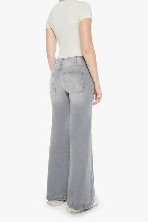 The Hustler Roller Patch Pocket Sneak Noted! by MOTHER, trendy 70s-inspired wide-leg jeans with a high rise and patch pockets. Perfect for a relaxed, stylish look in faded light grey with a clean hem.