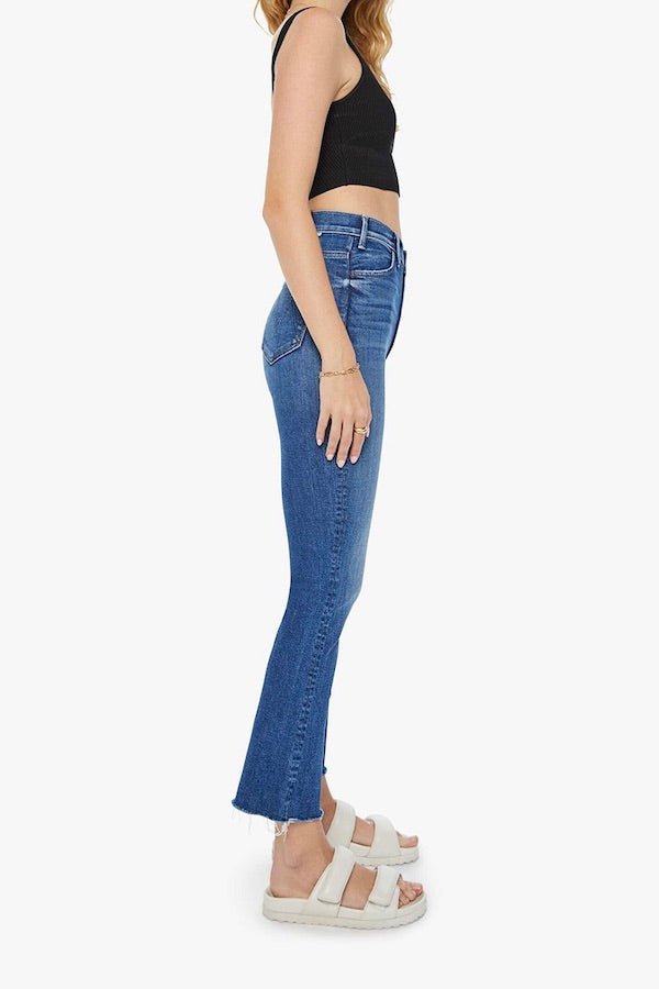 The Hustler Ankle Fray Grasping At Straws by Mother, high-rise ankle flare jeans in medium blue with raw hem, stretchy fit, perfect for everyday cool style.