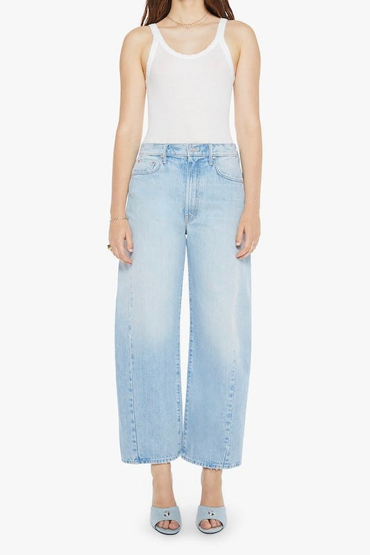 The Full Pipe Flood Back Pedal by MOTHER, trendy super high-waisted jeans with a full barrel leg and distressed details. Perfect for a relaxed, vintage-inspired look with a light blue wash.