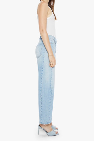 The Full Pipe Flood Back Pedal by MOTHER, trendy super high-waisted jeans with a full barrel leg and distressed details. Perfect for a relaxed, vintage-inspired look with a light blue wash.