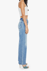 The Dodger Button Sneak Wipeout by MOTHER, trendy mid-blue jeans with a slouchy fit, loose straight leg, and a clean hem. Perfect for a relaxed look with whiskering and knee fading, made from rigid SUPERIOR denim.