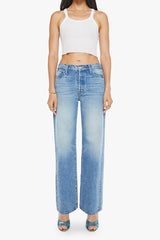 The Dodger Button Sneak Wipeout by MOTHER, trendy mid-blue jeans with a slouchy fit, loose straight leg, and a clean hem. Perfect for a relaxed look with whiskering and knee fading, made from rigid SUPERIOR denim.