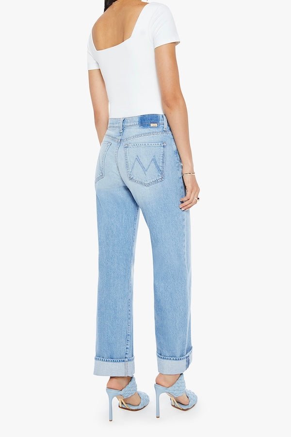 The Dodger Button Hover Cuff Funk N'Flair by MOTHER, trendy low-rise jeans with a slouchy fit, loose straight leg, and vintage-inspired details. Perfect for a relaxed, worn-in look with whiskering, knee fading, and a cuffed hem.