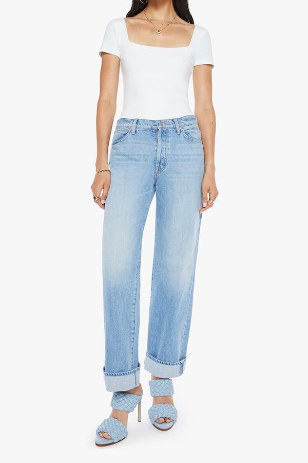 The Dodger Button Hover Cuff Funk N'Flair by MOTHER, trendy low-rise jeans with a slouchy fit, loose straight leg, and vintage-inspired details. Perfect for a relaxed, worn-in look with whiskering, knee fading, and a cuffed hem.