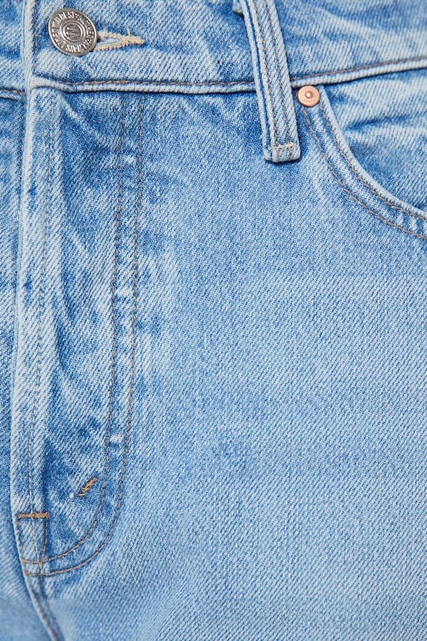 The Dodger Button Hover Cuff Funk N'Flair by MOTHER, trendy low-rise jeans with a slouchy fit, loose straight leg, and vintage-inspired details. Perfect for a relaxed, worn-in look with whiskering, knee fading, and a cuffed hem.