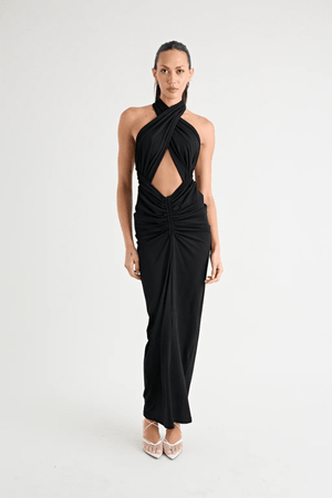 Victoria Maxi Dress Black by Pfeiffer – A sleek, versatile maxi with adjustable halter, removable shrug, and ruching, perfect for elegant, adaptable style.