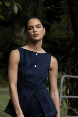 Good Vibes Top Indigo by Pasduchas – Trendy stretch denim with structured fit, gold snap studs, and mock pockets; perfect for chic, coordinated looks.