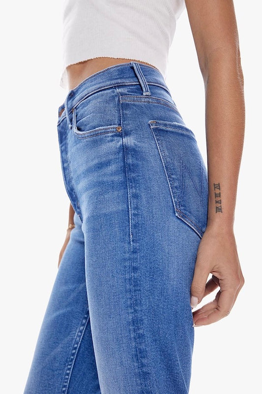 The Tomcat Layover by MOTHER, bestselling high-rise straight leg with button fly, cropped inseam, mid-blue wash with whiskering, perfect for casual, cool vibes.