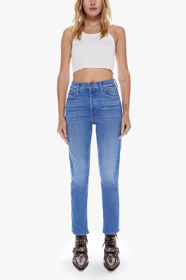 The Tomcat Layover by MOTHER, bestselling high-rise straight leg with button fly, cropped inseam, mid-blue wash with whiskering, perfect for casual, cool vibes.