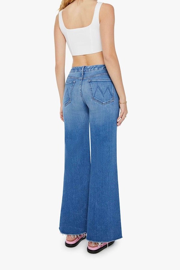 The Roller Fray Work Hard Play Hard by Mother, high-waisted wide-leg jeans with a 31-inch inseam and frayed hem, perfect for casual, trendy looks.