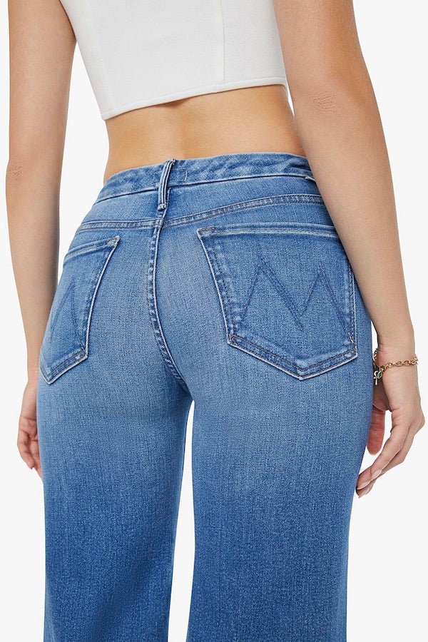 The Roller Fray Work Hard Play Hard by Mother, high-waisted wide-leg jeans with a 31-inch inseam and frayed hem, perfect for casual, trendy looks.