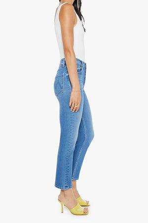 The Tomcat Ankle Piece By Piece by MOTHER, trendy high-rise jeans with a straight leg, button fly, and ankle-length inseam. Perfect for a stylish, everyday look with subtle whiskering and fading.