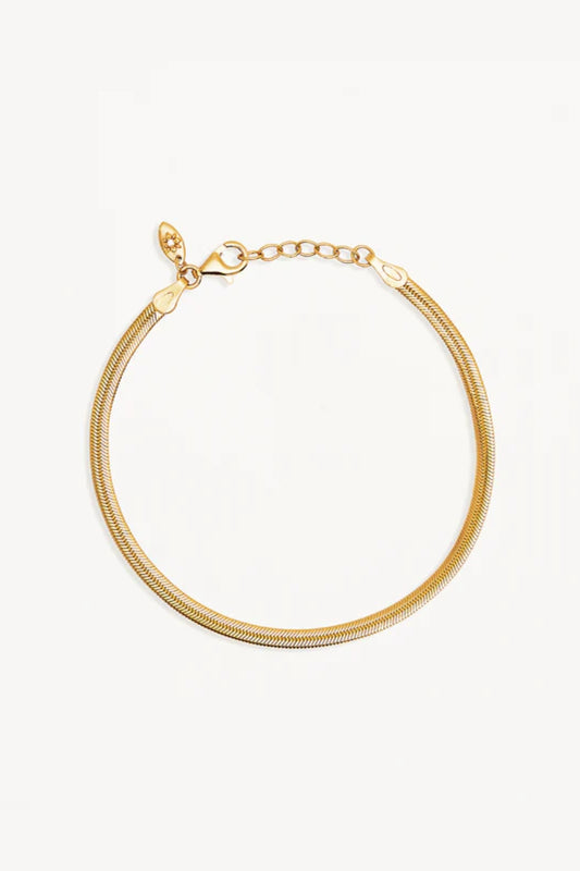 18k Gold Vermeil Herringbone Chain Bracelet by By Charlotte, sleek snake chain design. Perfect for layering with cuffs or bangles.