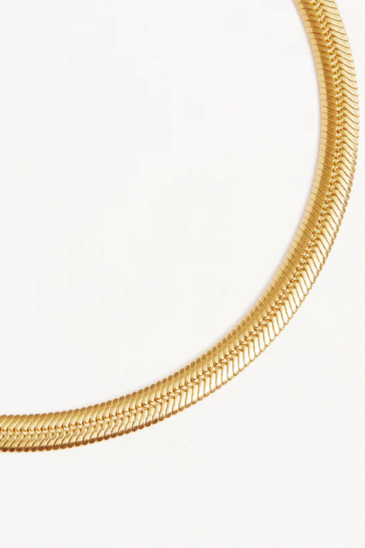 18k Gold Vermeil Herringbone Chain Bracelet by By Charlotte, sleek snake chain design. Perfect for layering with cuffs or bangles.