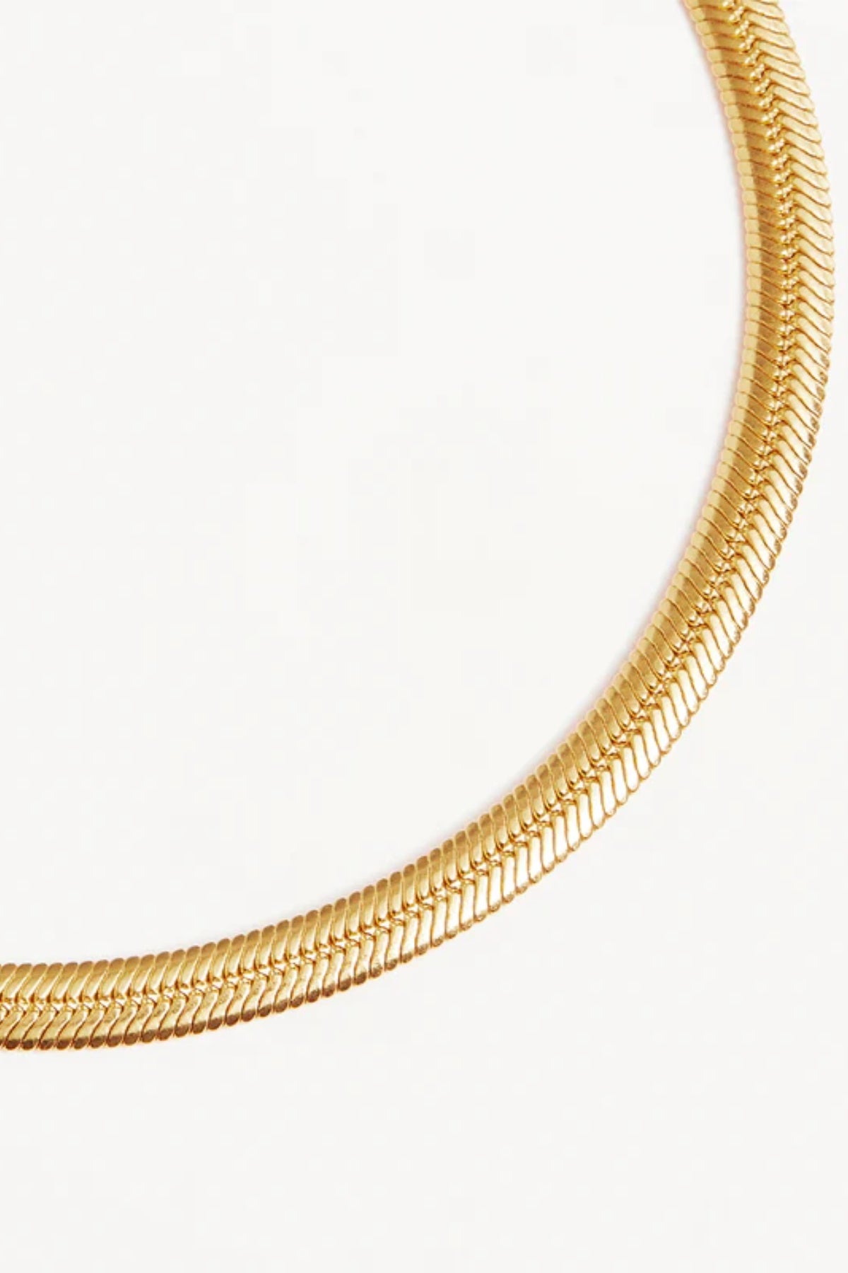 18k Gold Vermeil Herringbone Chain Bracelet by By Charlotte, sleek snake chain design. Perfect for layering with cuffs or bangles.