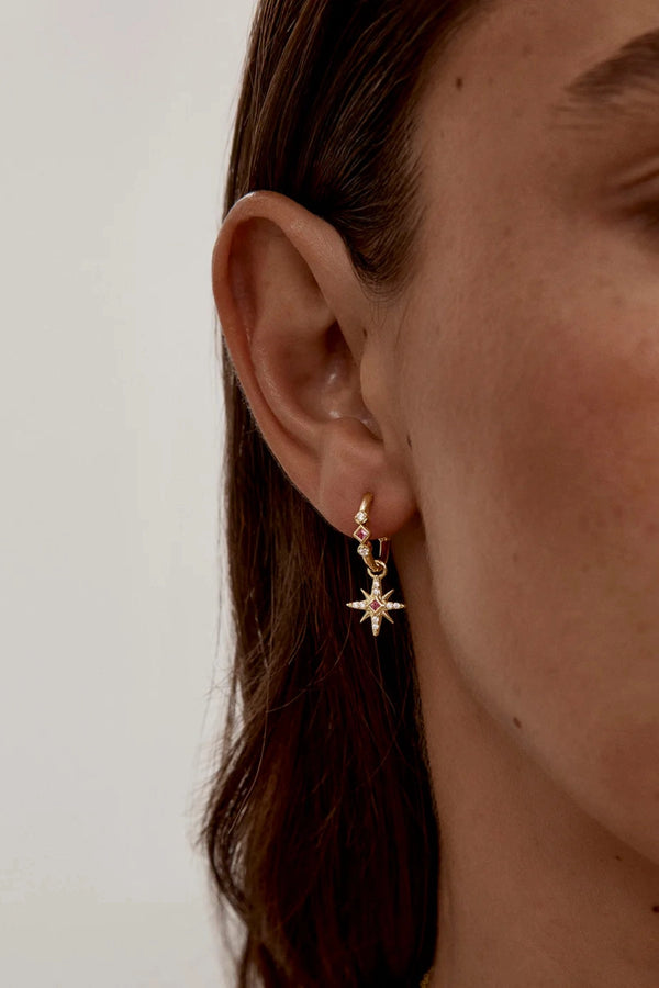 18k Gold Vermeil Starry Night Hoops by By Charlotte - gold hoops with star charms and pink stones, designed for a delicate celestial look.