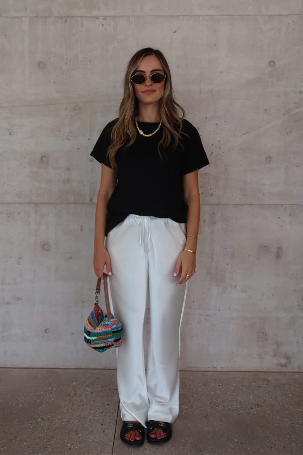 Black Tee by Sneaky Link – Trendy loose-fit 100% cotton classic black tee, a versatile essential for any capsule wardrobe and everyday casual looks.