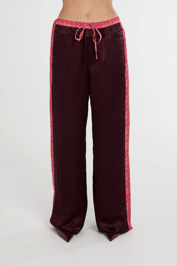 Boxer Pant Plum by Summi Summi, relaxed wide-leg pant with drawstring waistband and NEON PLAID side panels for a stylish, comfortable fit. Made from 100% acetate woven fabric.