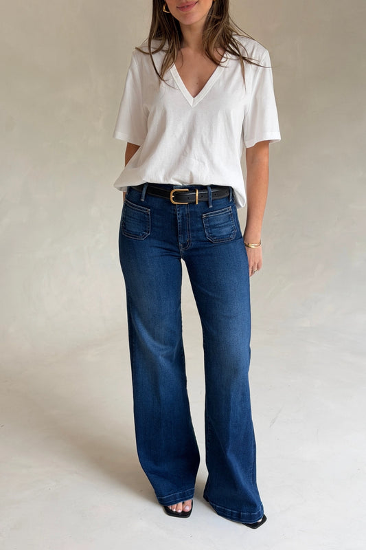 The Hustler Roller Patch Pocket Sneak Taking Chances by MOTHER – high rise wide leg jeans. Perfect for everyday styling.